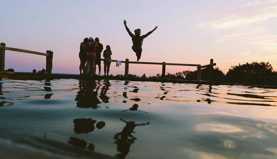Person diving into water
