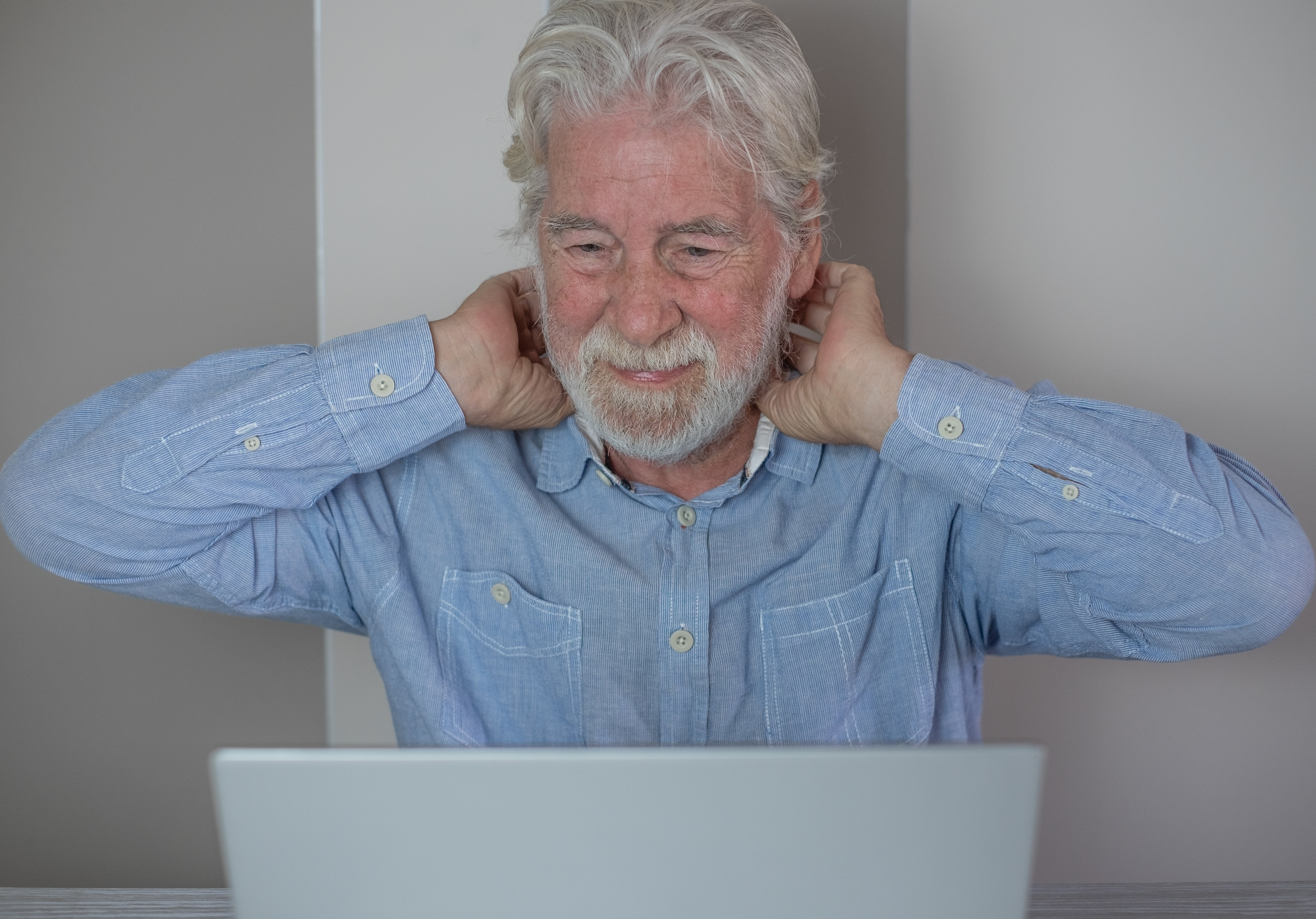 senior man doing physio online